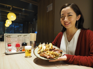 Toast with its signature dish, kushiyaki, and beer!